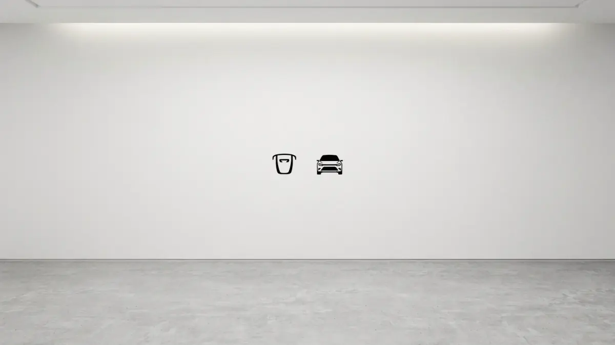 Ideogram 4.5: a white wall over a concrete floor, with two small black car icons printed in the middle of the wall