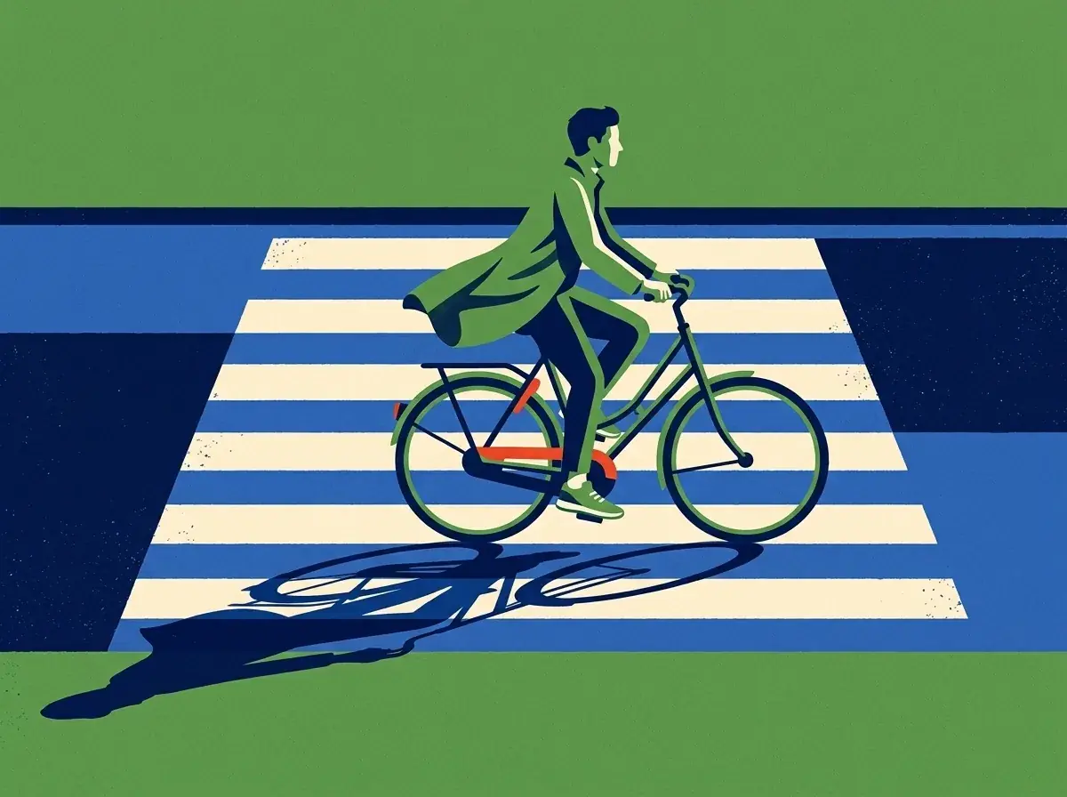 A flat screen-printed spot on leaf green: a rider in a long green coat crossing the cream stripes of a street crossing on a bicycle with a red frame, a long navy shadow stretched beside them
