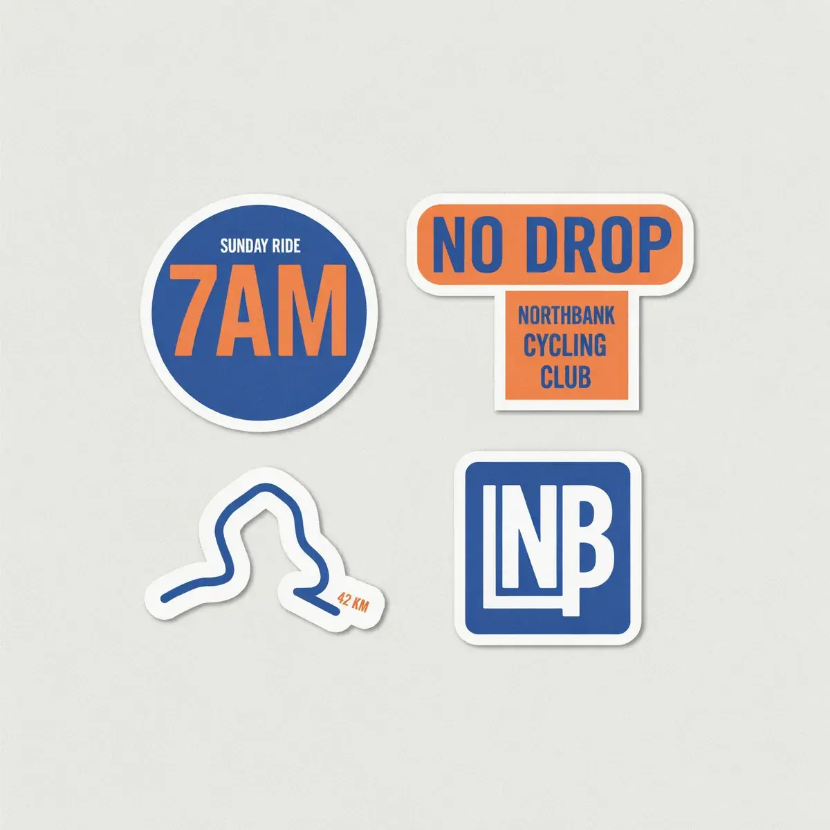 The Northbank Cycling Club sheet from Ideogram 4.5: smaller stickers on pale grey, the club name merged under the NO DROP sticker and the monogram drawn as LNB